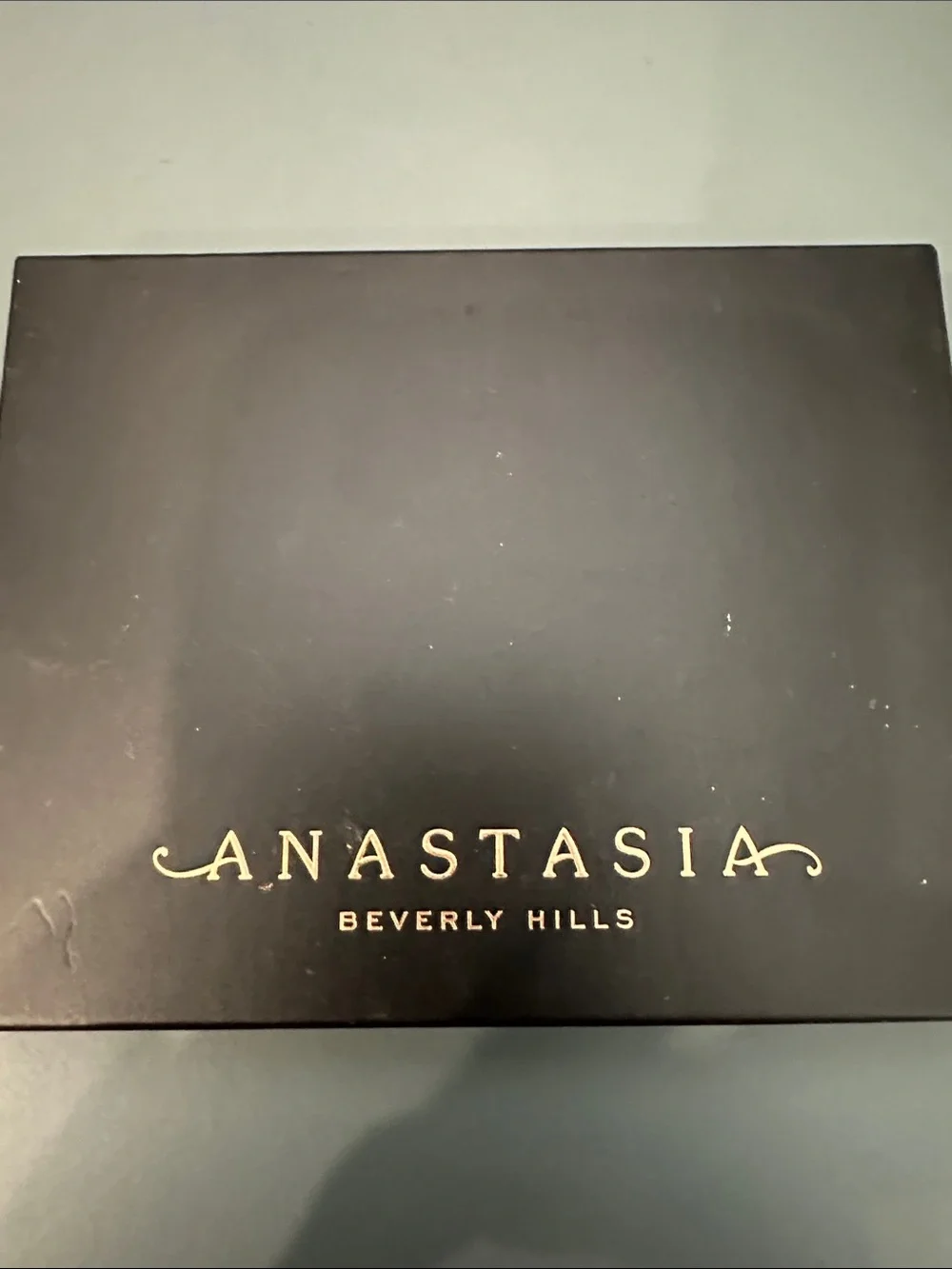 Anastasia Beverly Hills Black Case with Gold Logo for Electronics